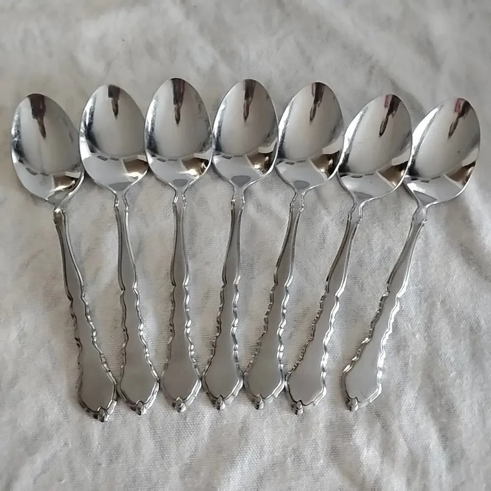 7 Oneida Community Satinique Teaspoons 6